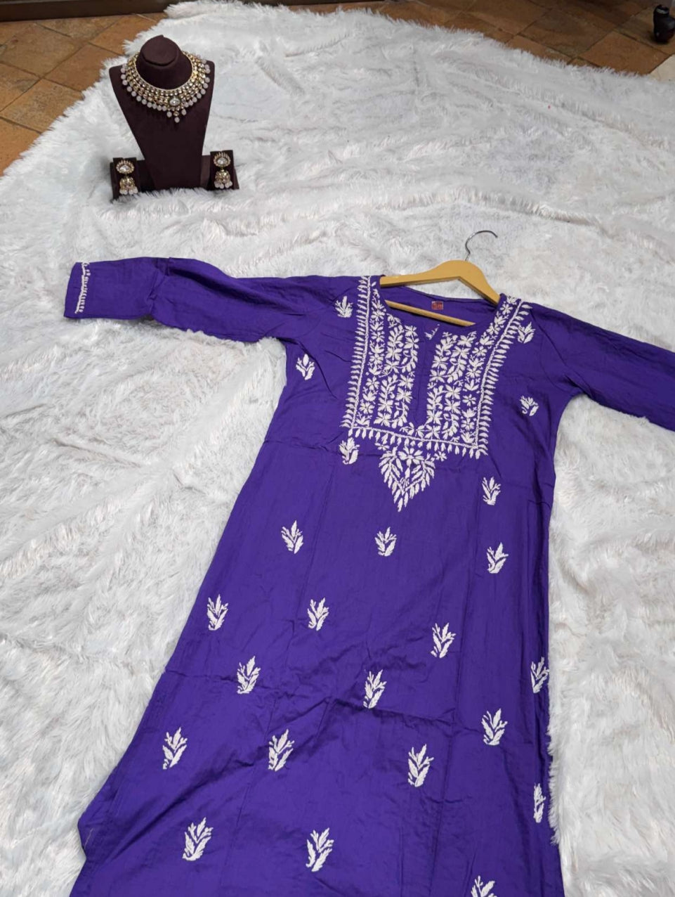Shop Purple Chikankari kurti for women with elegant white embroidery.